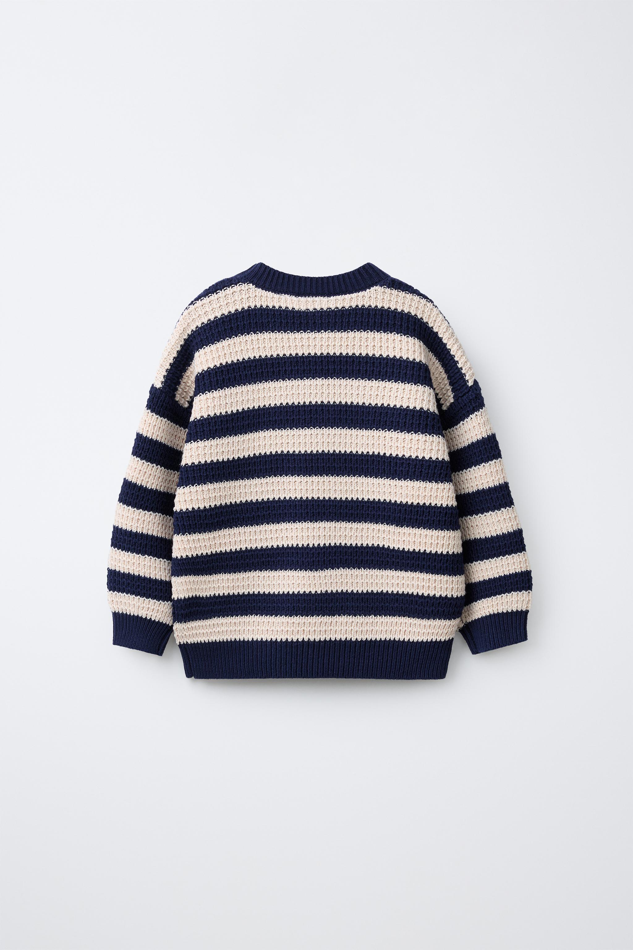 PULL EN MAILLE À RAYURES AVEC INSCRIPTION BRODÉE